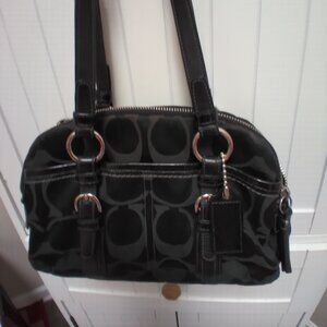 Black canvas with leather trim Coach purse